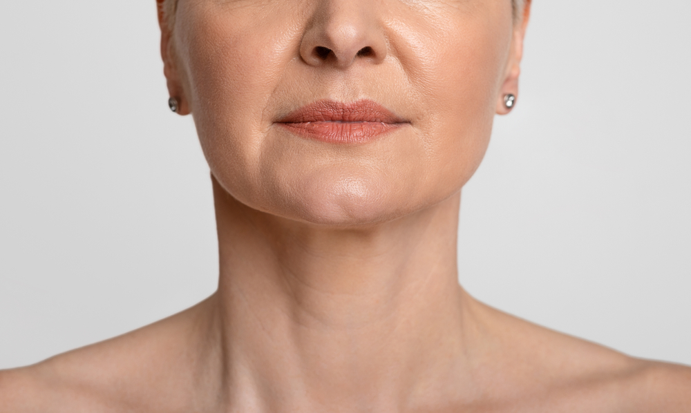 Close-up of a woman's neck and lower face, illustrating areas that can benefit from Ultherapy's skin tightening and collagen-boosting effects.